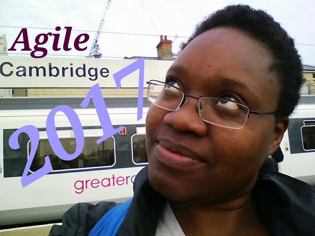 Selfie of Kathleen musing at Cambridge train station, the words Agile Cambridge 2017 appear on the photo