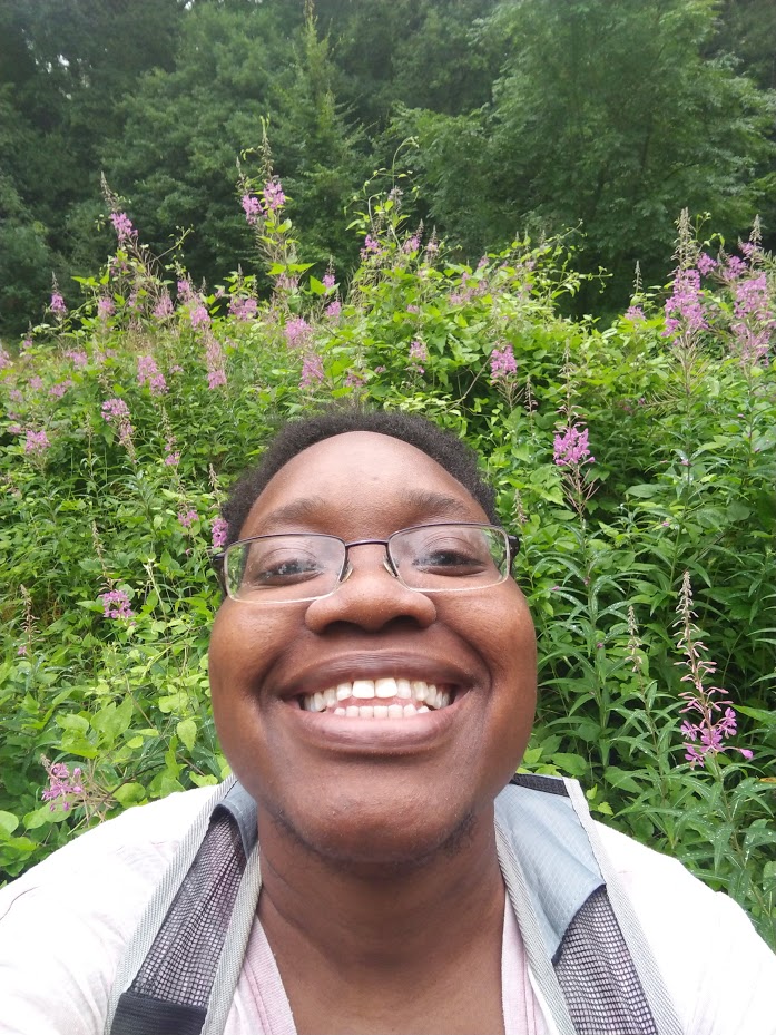 LiLi smiles with trees and flowers
