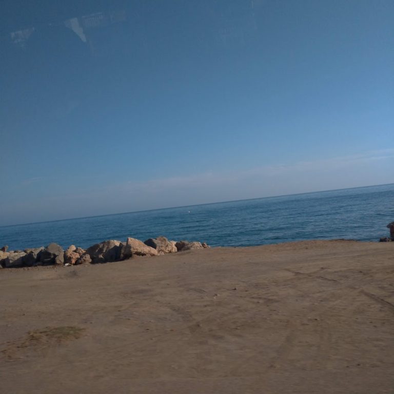 sandy beach, blue sea, blue sky