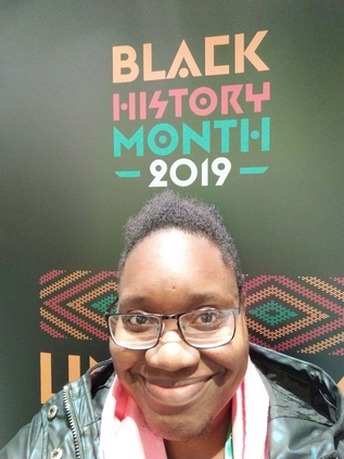 LiLi Kathleen smiling with words 'Black History Month 2019' emblazoned boldy above